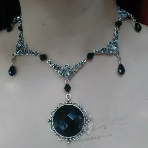Handmade beaded choker necklace with filigree connectors, black Austrian crystal beads and a large black cabochon in a filigree frame