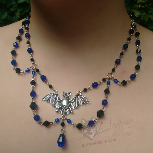 Handmade adjustable gothic choker necklace with blue Czech crystal and black Austrian crystal beads and a large bat pendant