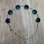Adjustable stainless steel cabochon bracelet with blue resin mermaid scales