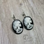 Stainless steel leverback earrings with skeleton cameos