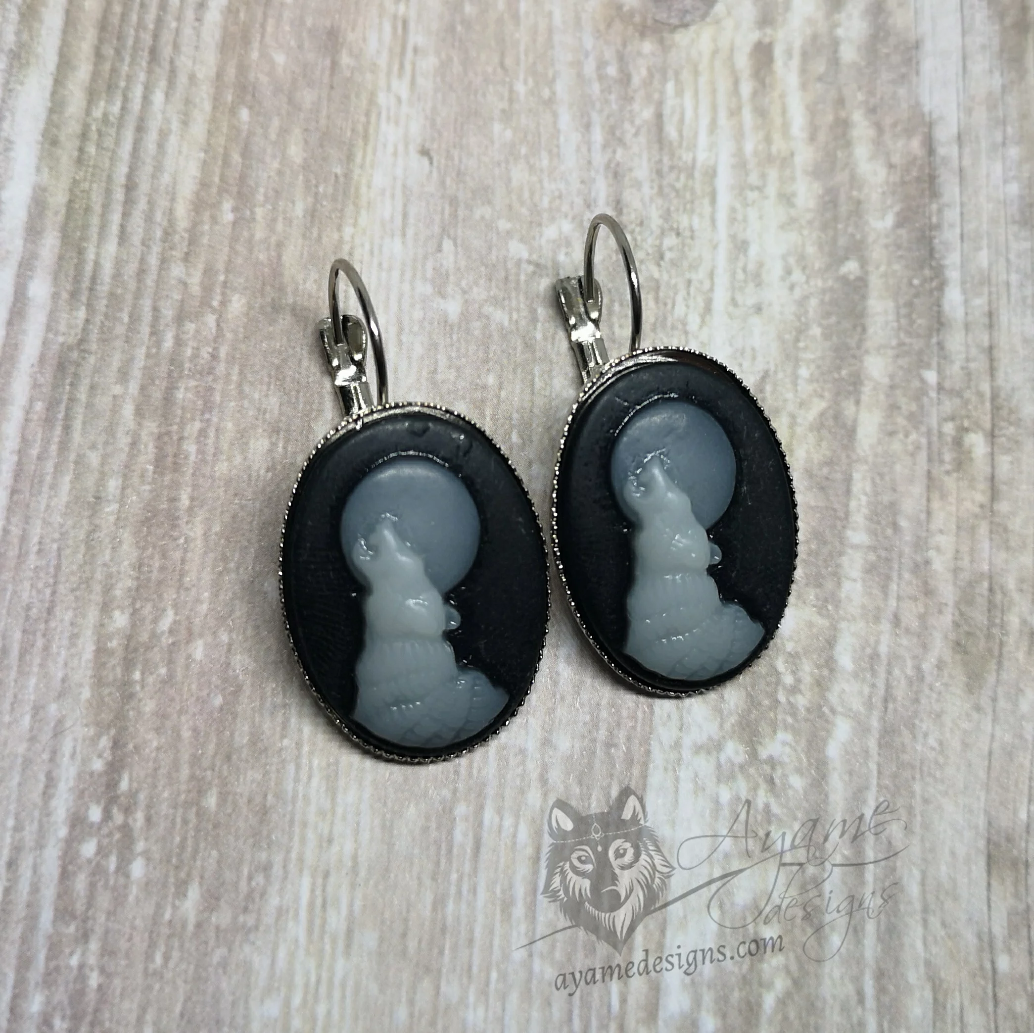Stainless steel leverback earrings with wolf cameos