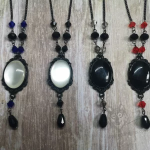 Handmade adjustable gothic necklace with a resin cabochon in a black filigree frame, Austrian crystal beads and black stainless steel chain