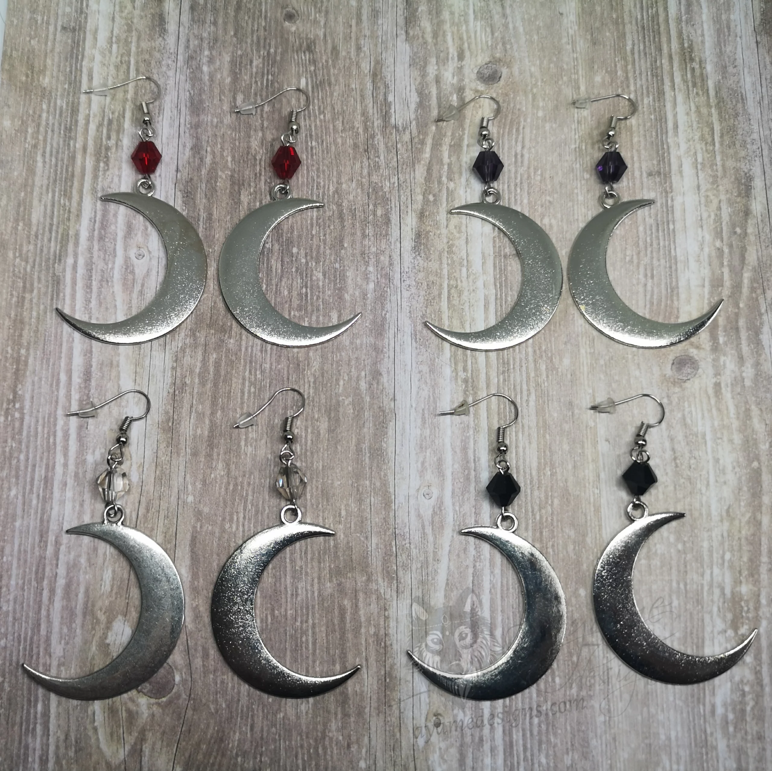 Handmade fantasy earrings with crescent moon charms, Austrian crystal beads and stainless steel earring hooks