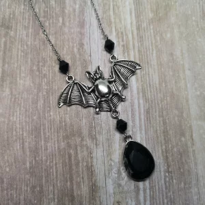 Adjustable gothic necklace with a large bat and black teardrop pendant, with a few Austrian crystal beads and stainless steel chain