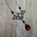 Adjustable gothic necklace with a large bat and red teardrop pendant, with a few Austrian crystal beads and stainless steel chain