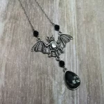 Adjustable gothic necklace with a large bat and grey teardrop pendant, with a few Austrian crystal beads and stainless steel chain
