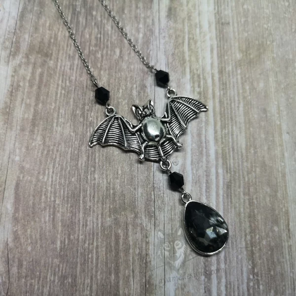Adjustable gothic necklace with a large bat and grey teardrop pendant, with a few Austrian crystal beads and stainless steel chain