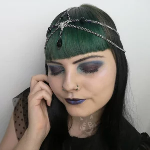 Handmade festival head chain with a filigree charm, black and purple Austrian crystal beads and stainless steel chain