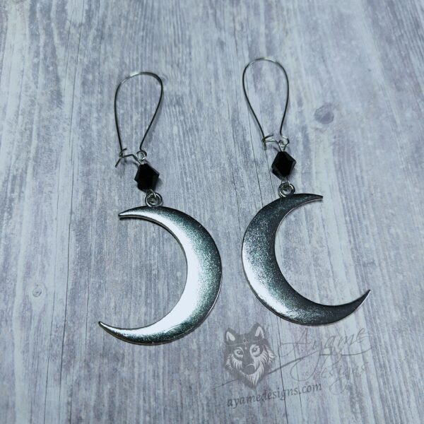 Handmade fantasy earrings with crescent moon charms, black Austrian crystal beads and stainless steel earring hooks
