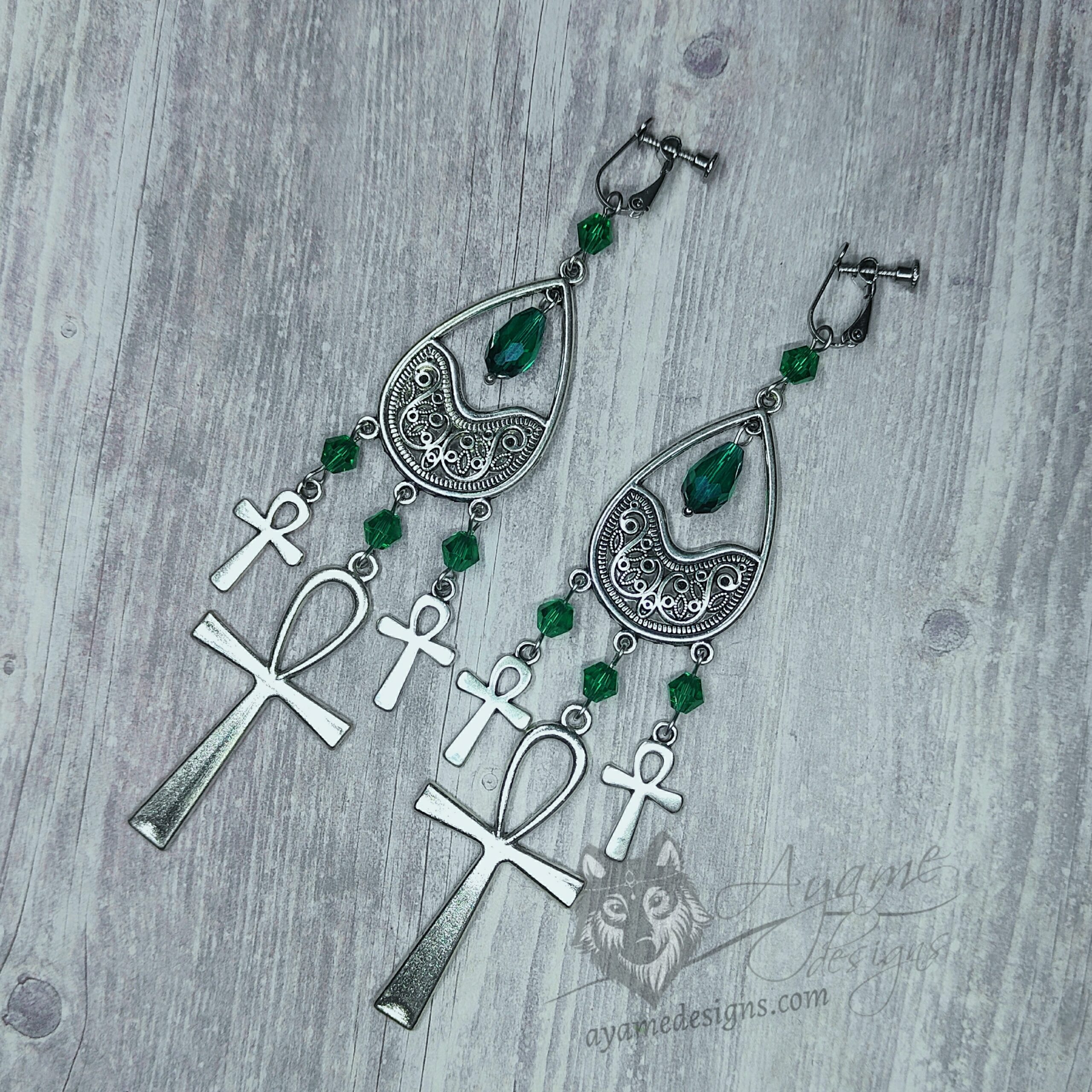 Handmade gothic earrings with filigree and ankh charms, teal green Austrian crystal beads and stainless steel clip-on earrings