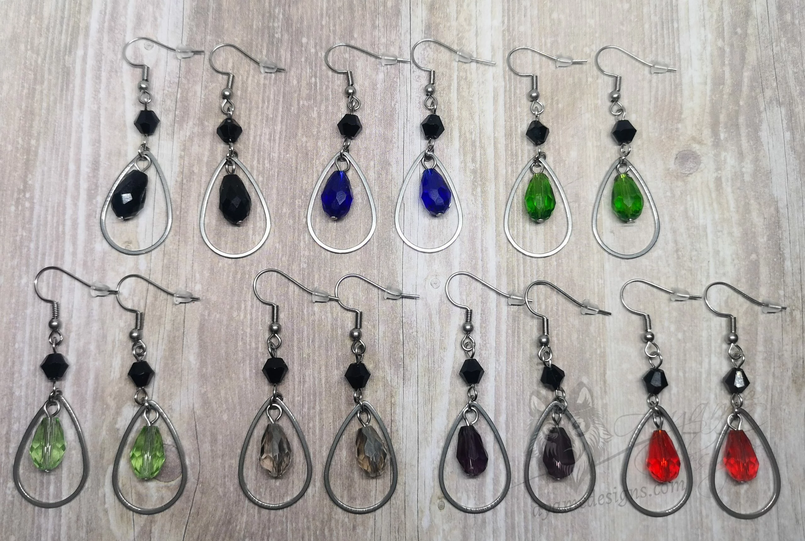 Handmade earrings with stainless steel teardrop charms, with Austrian crystal beads, on stainless steel earring hooks