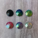 Mermaid scale colour options - black, blue, light green, pink, purple and white