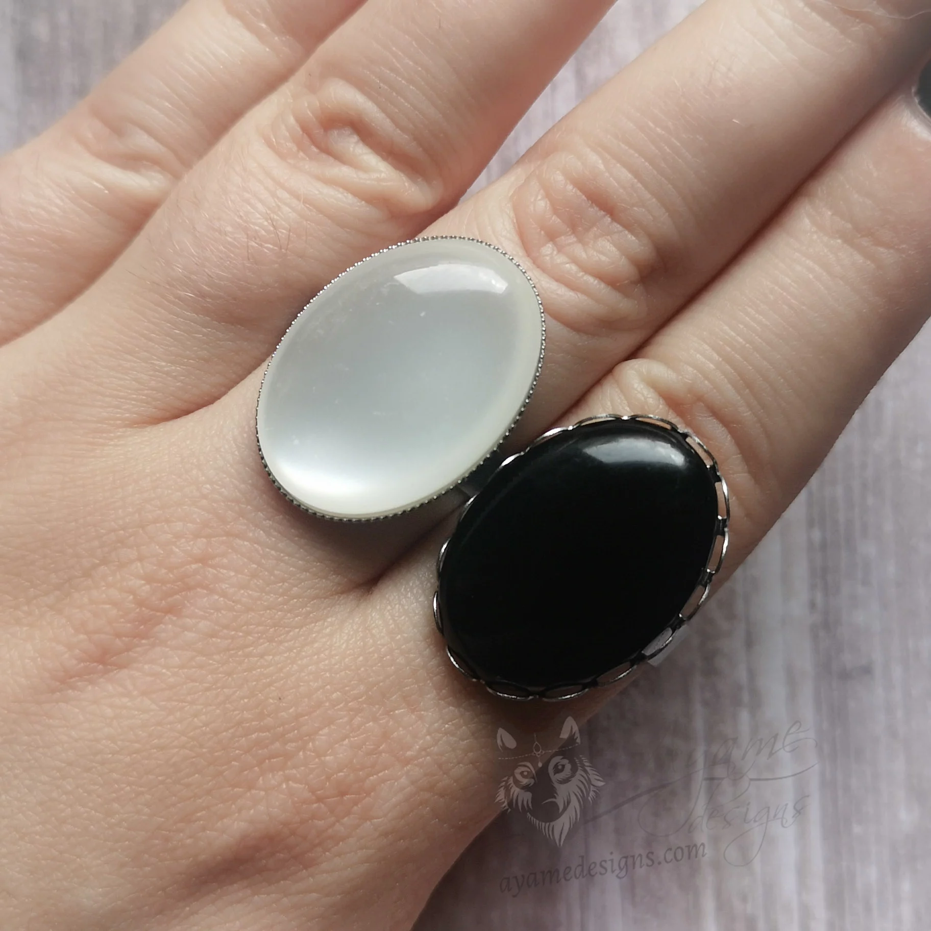 Adjustable stainless steel ring with resin cabochon