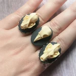 Adjustable stainless steel ring with resin animal skull