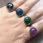 Adjustable stainless steel ring with resin cabochon