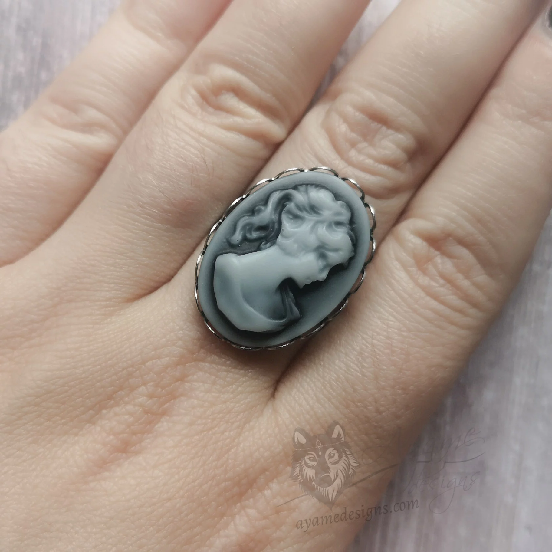 Adjustable stainless steel ring with a Victorian cameo
