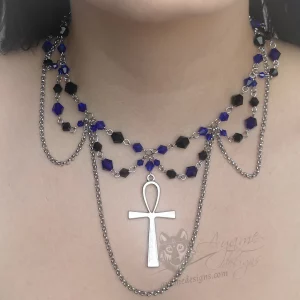 Handmade adjustable choker necklace with a large ankh pendant, black and blue Austrian crystal beads and stainless steel chain details