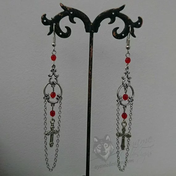 Handmade gothic earrings with filigree connectors, tiny crosses, red Czech crystal beads, chain details and stainless steel earring hooks