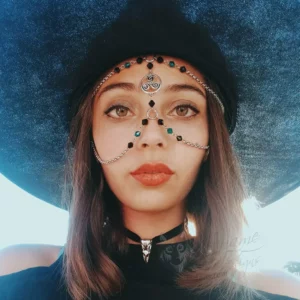 Handmade fantasy festival head chain with a celtic Triquetra charm, black and teal Austrian crystal beads and stainless steel chain