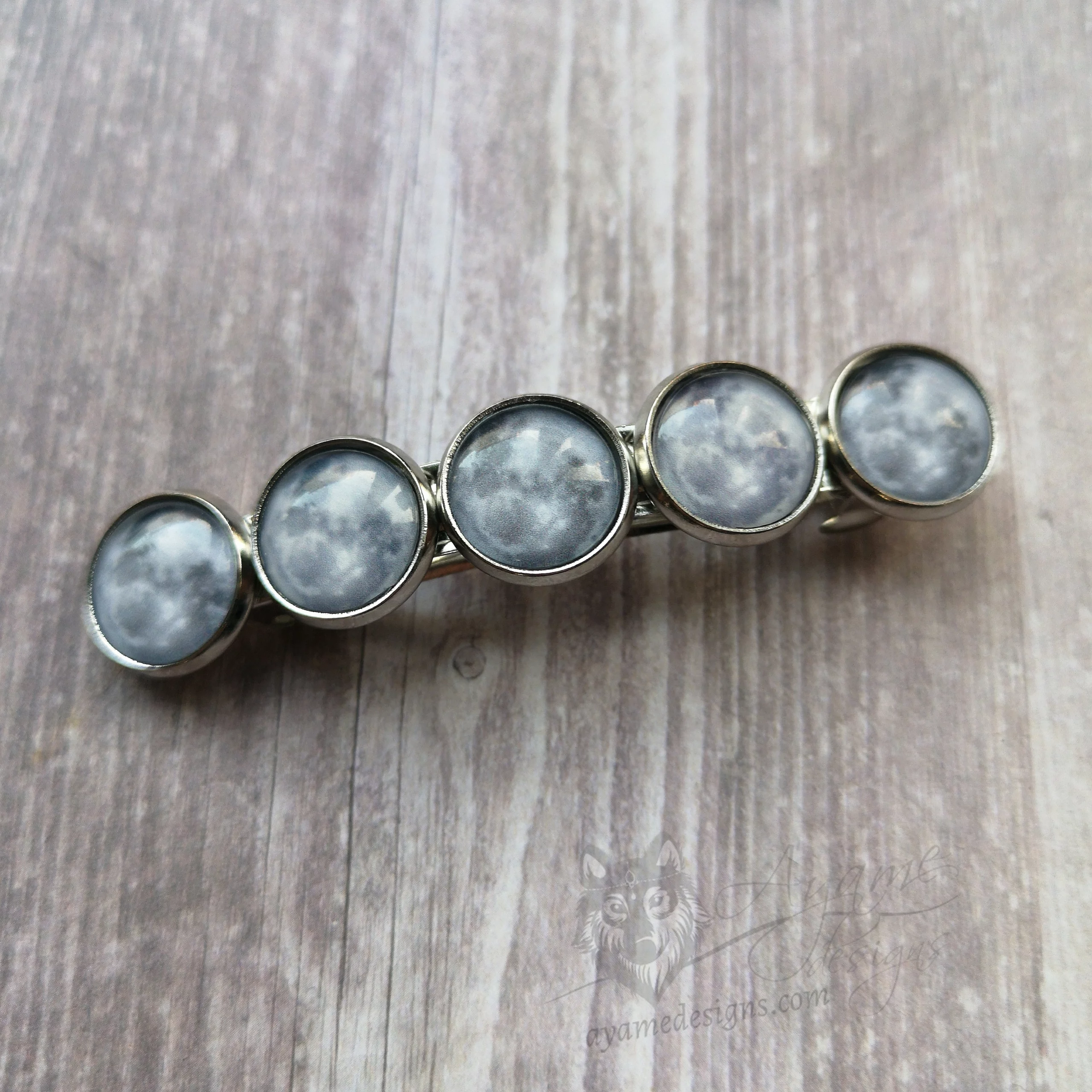 Hair barrette with full moon glass cabochons