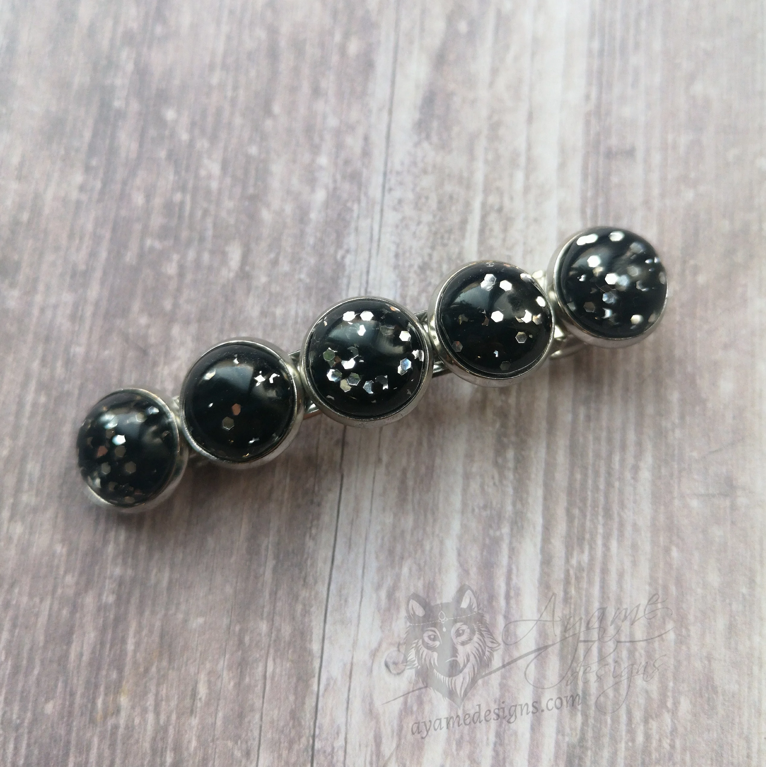 Hair barrette with black and glitter resin cabochons