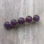 Hair barrette with purple and glitter resin cabochons