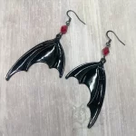 Handmade gothic earrings with large black bat wings and red Austrian crystal beads on stainless steel earring hooks