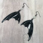 Handmade gothic earrings with large black bat wings and white Austrian crystal beads on stainless steel earring hooks