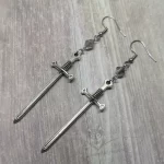 Handmade fantasy earrings with silver sword pendants, grey Austrian crystal beads and stainless steel earring hooks