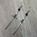 Handmade fantasy earrings with silver sword pendants, black Austrian crystal beads and stainless steel earring hooks