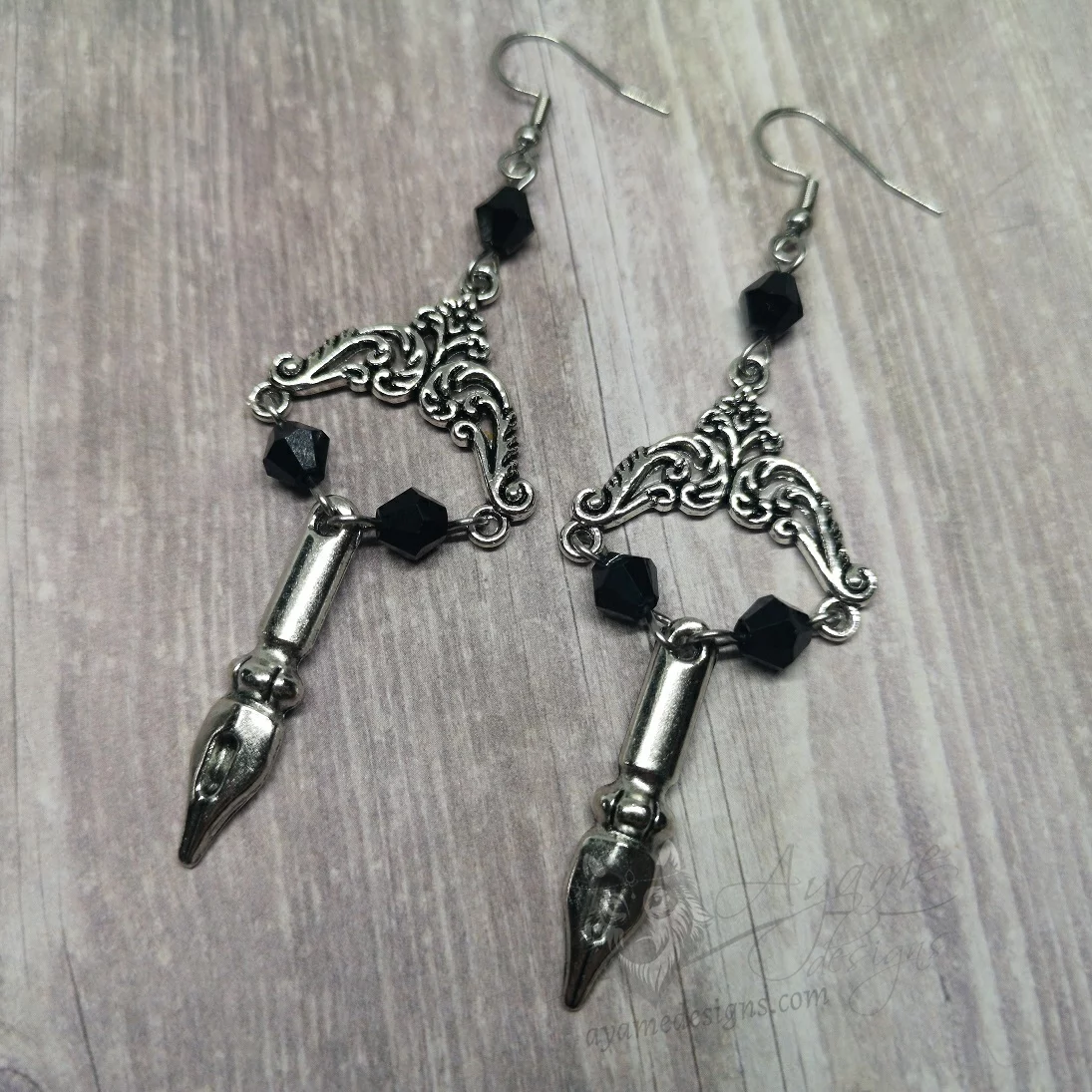 Handmade Victorian gothic earrings with filigree and pen tip charms, black Austrian crystal beads and stainless steel earring hooks