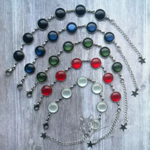 Adjustable stainless steel bracelet with small resin cabochons in black, blue, green, red and white