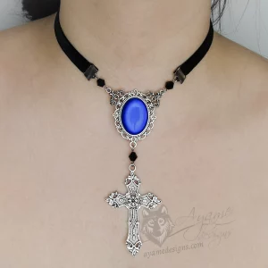 Handmade adjustable black velvet choker necklace with Austrian crystal beads, a large blue resin cabochon pendant in a silver filigree frame, and a Byzantine cross pendant