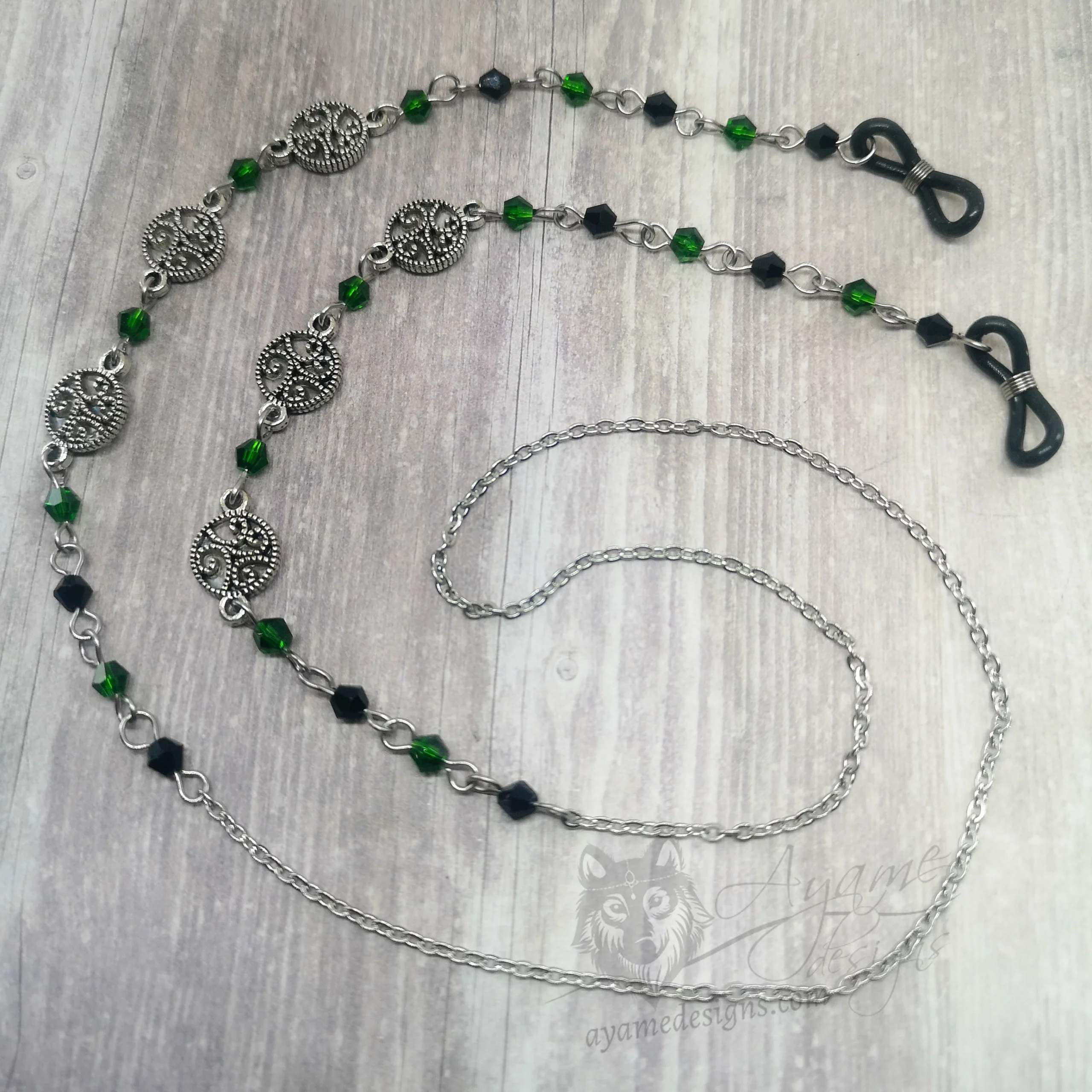 Handmade gothic glasses chain with filigree swirl charms, green and black Austrian crystal beads and stainless steel chain