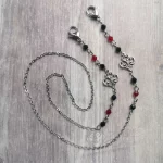 Handmade gothic mask chain with dainty filigree charms, red and black Austrian crystal beads and stainless steel chain