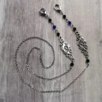 Handmade gothic mask chain with filigree charms, blue and black Austrian crystal beads and stainless steel chain