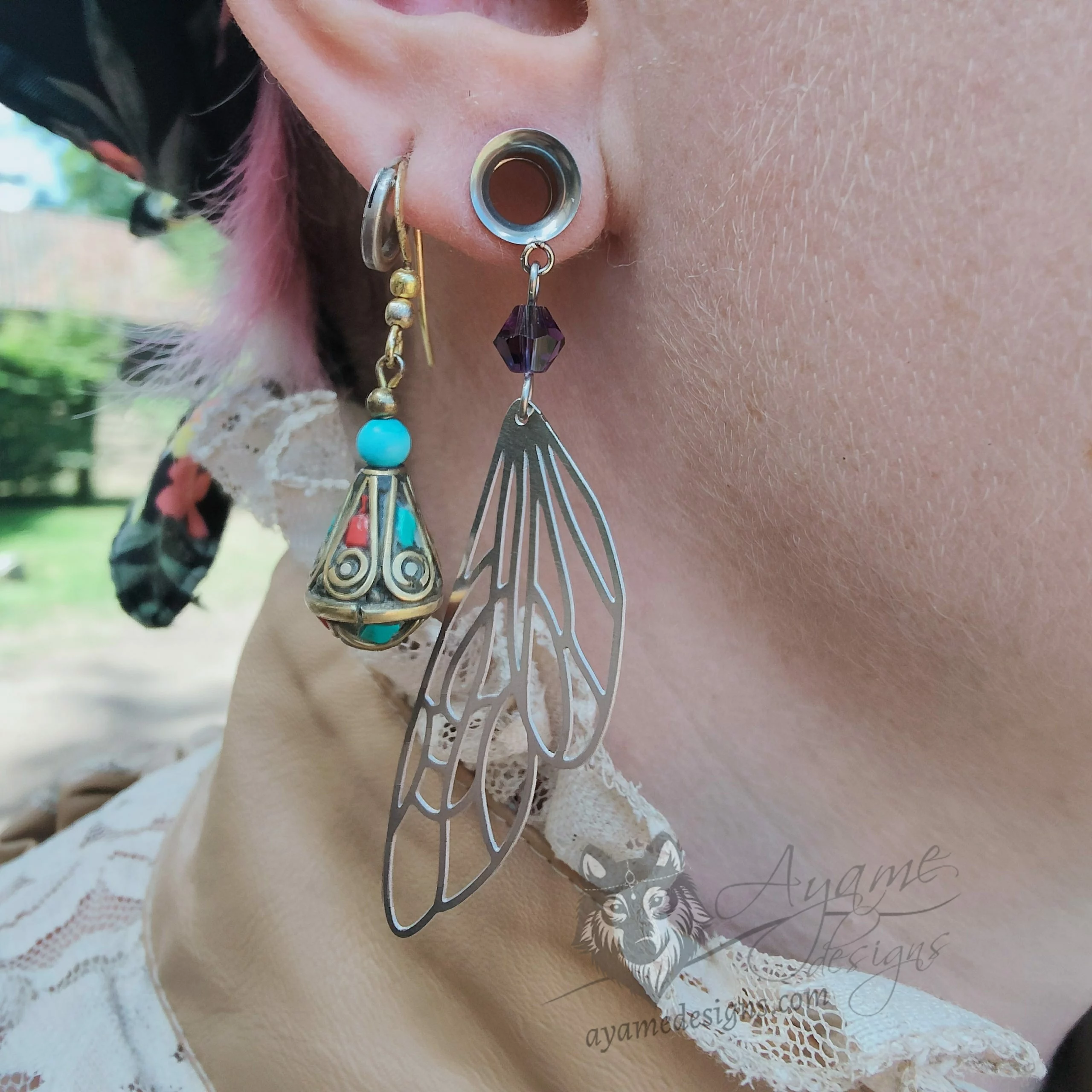 Handmade dangly stainless steel tunnels for stretched ears with fairy wing charms and purple Austrian crystal beads