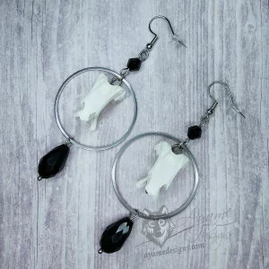 Handmade earrings with duck vertebrae inside large stainless steel rings, with black Austrian crystal beads, on stainless steel earring hooks