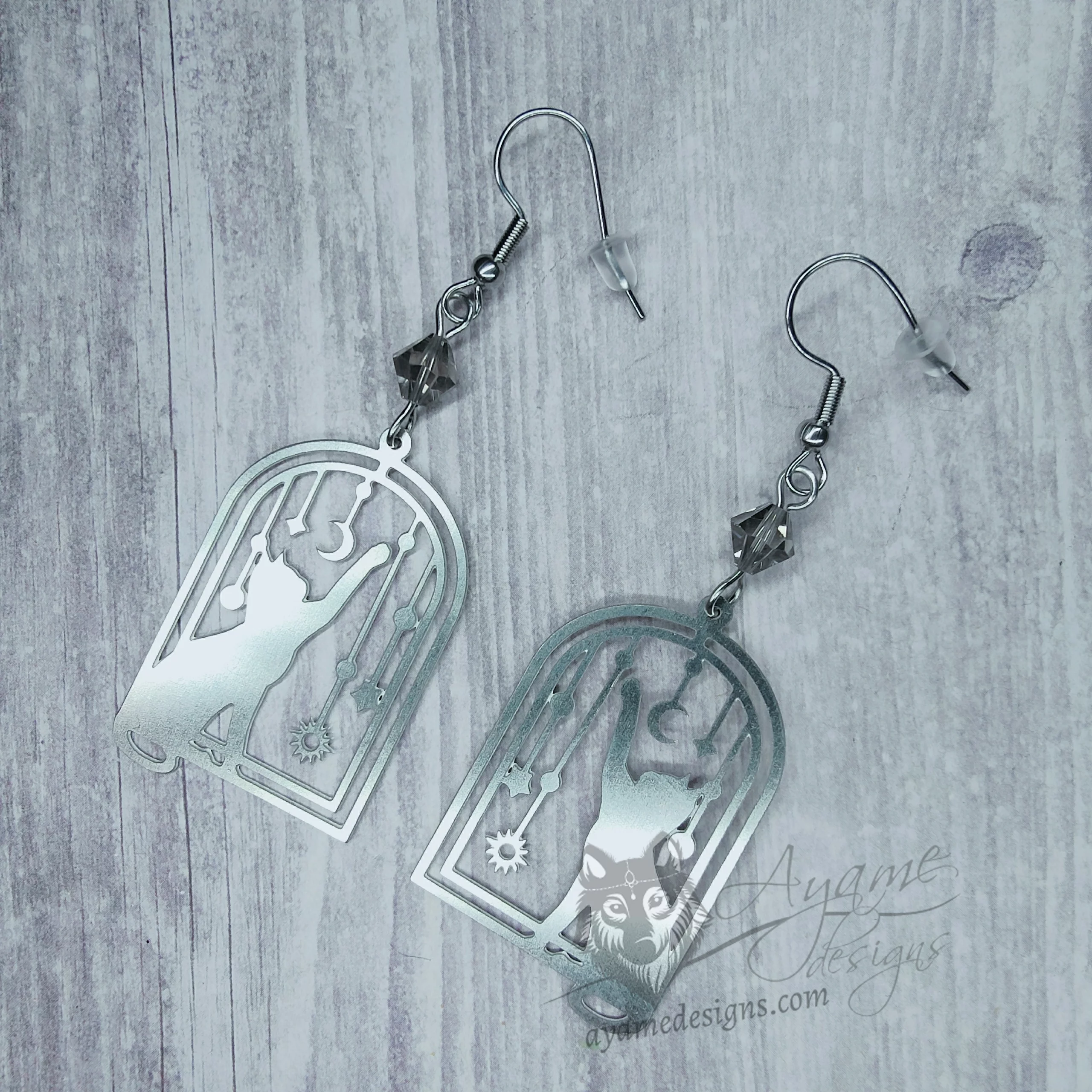 Handmade earrings with laser cut stainless steel cat charms with grey Austrian crystal beads, on stainless steel earring hooks