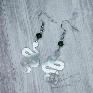 Handmade earrings with laser cut stainless steel snake charms with green Austrian crystal beads, on stainless steel earring hooks