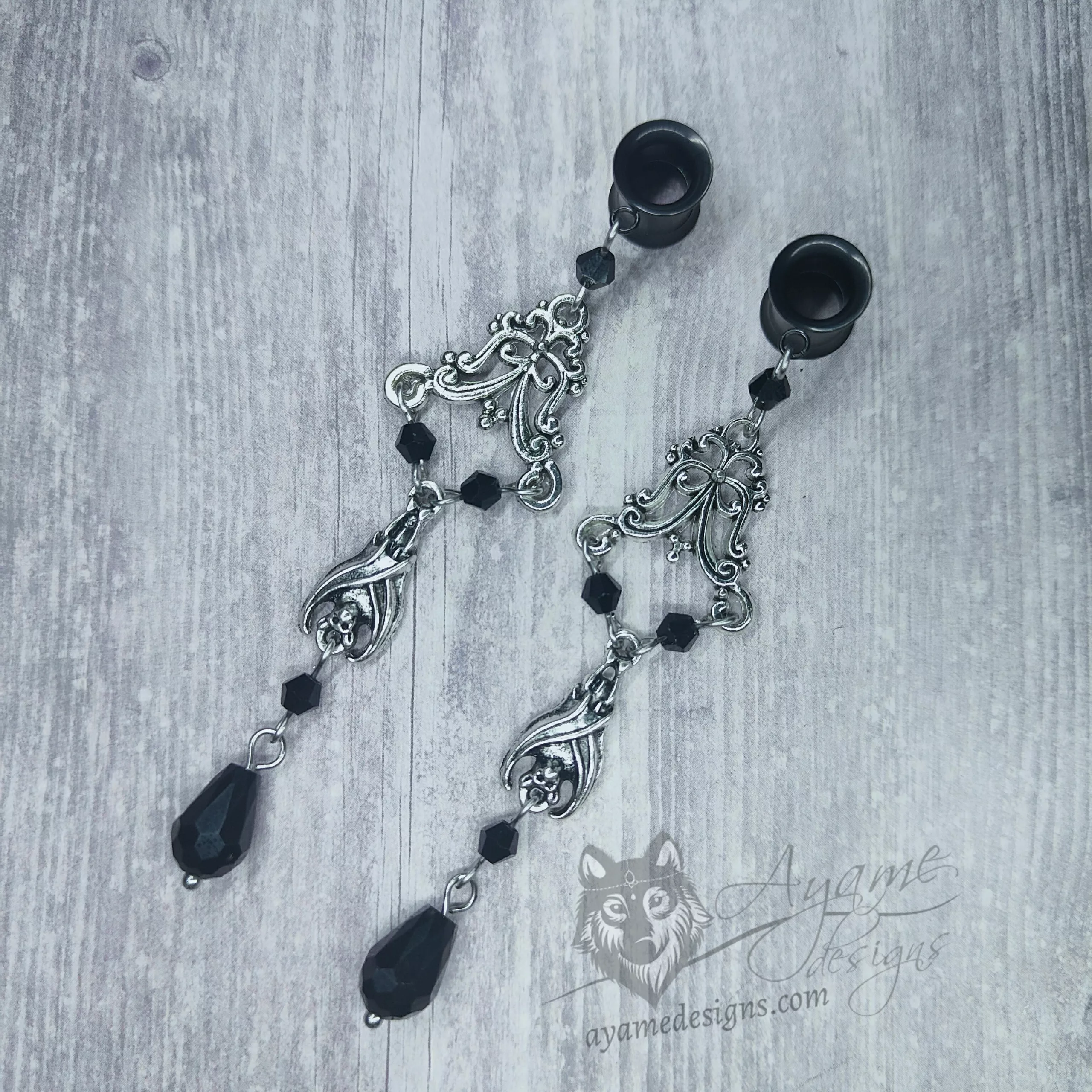 Handmade gothic dangly stainless steel tunnels for stretched ears with bats and filigree charms, and black Austrian crystal beads