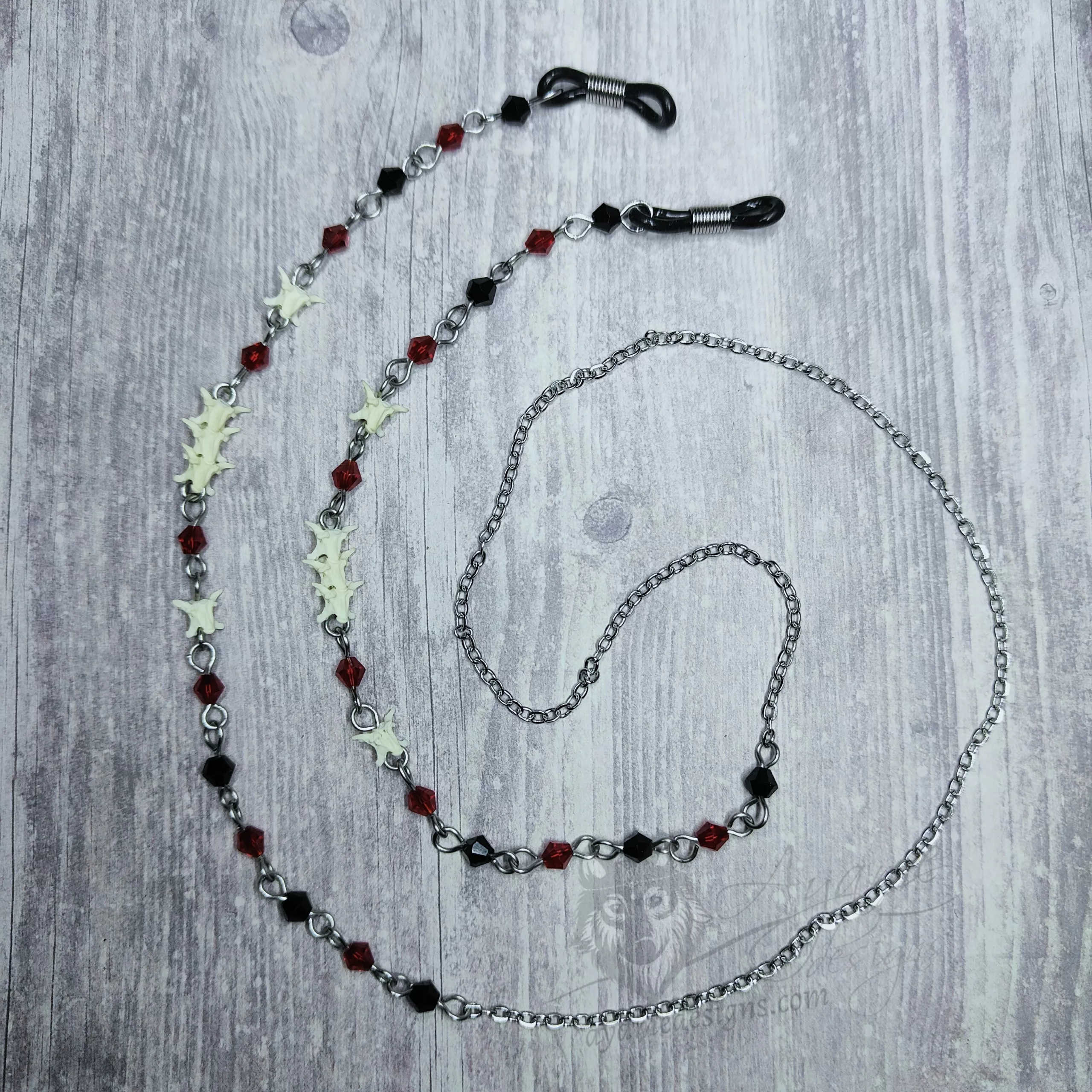 Handmade gothic glasses chain with tiny snake vertebrae, red and black Austrian crystal beads and stainless steel chain