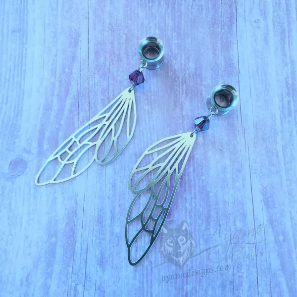 Handmade dangly stainless steel tunnels for stretched ears with fairy wing charms and purple Austrian crystal beads