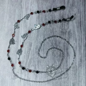 A handmade glasses chain made with laser cut stainless steel rose pendants (three on each side), Austrian crystal beads and stainless steel chain