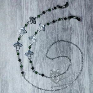 A handmade glasses chain made with laser cut stainless steel mushroom pendants (three on each side), Austrian crystal beads and stainless steel chain