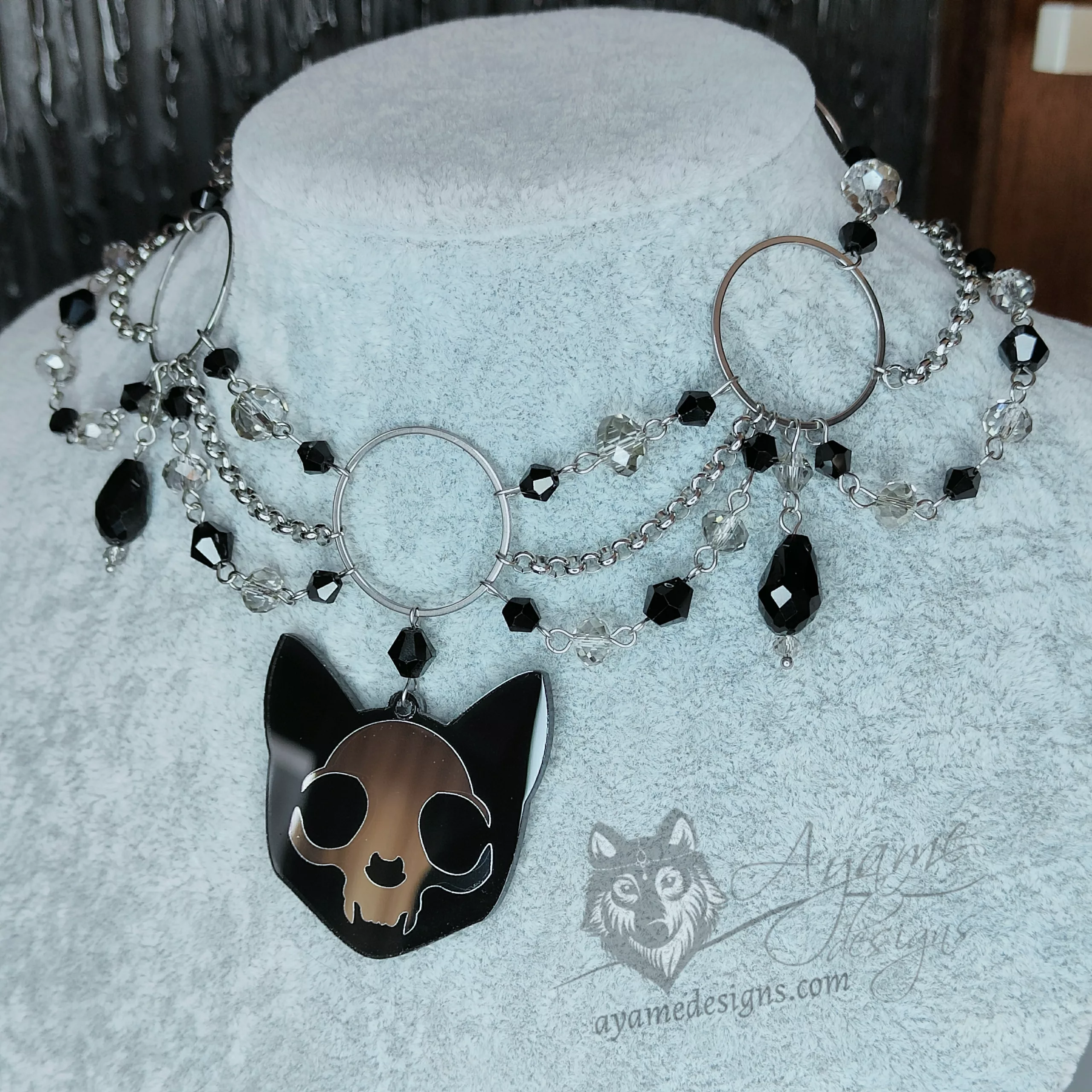 Handmade choker necklace with a large cat skull pendant, large rings, black and grey crystal beads and stainless steel chain