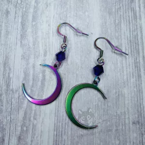Handmade earrings with rainbow laser cut stainless steel moon charms with blue Austrian crystal beads, on stainless steel earring hooks