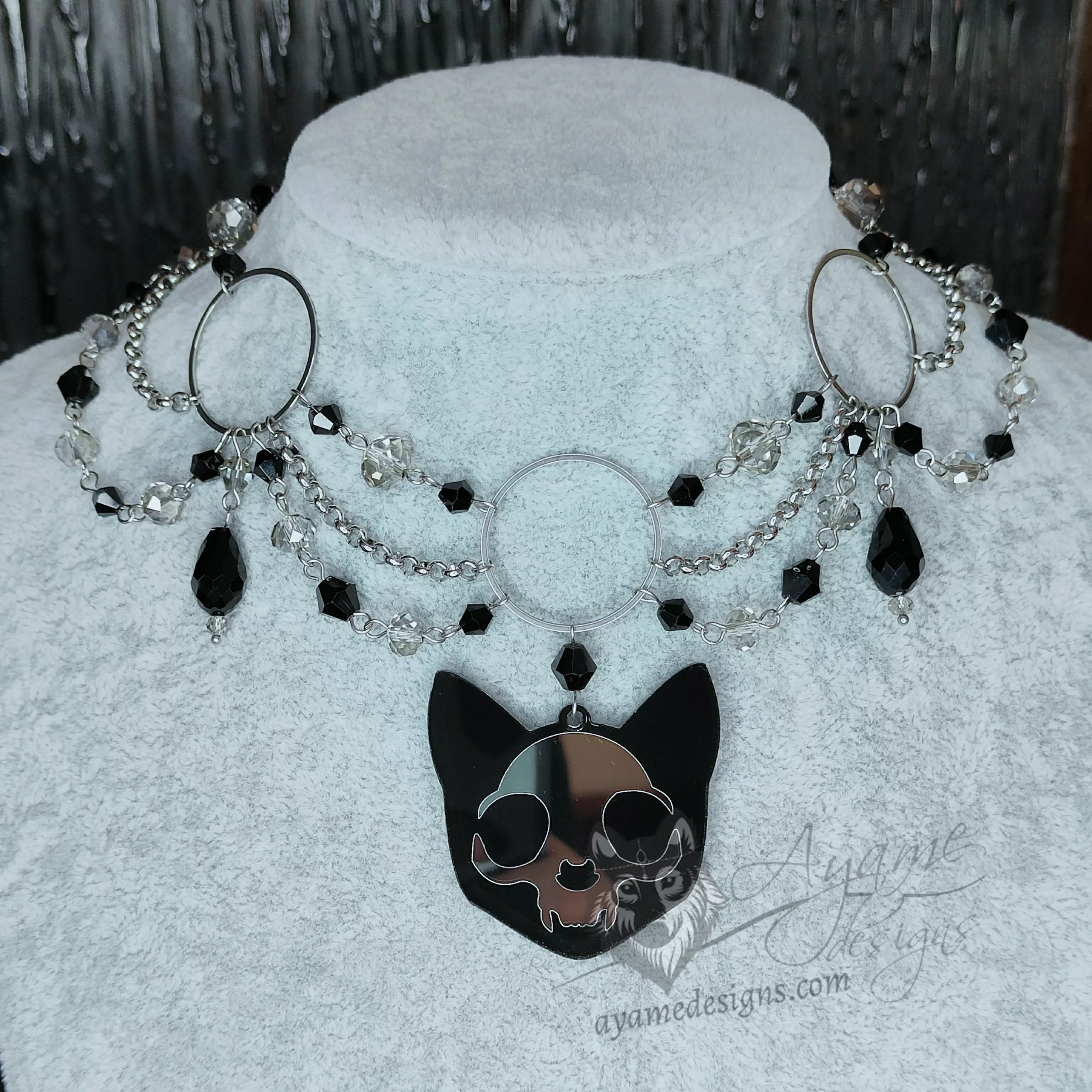 Handmade choker necklace with a large cat skull pendant, large rings, black and grey crystal beads and stainless steel chain